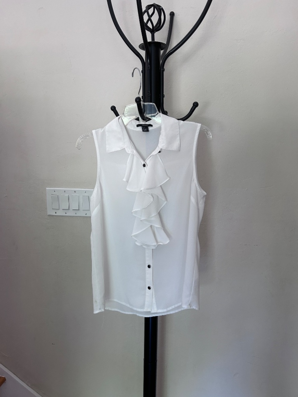 White Sleeveless black button blouse w soft feminine ruffle panel wrinkle free